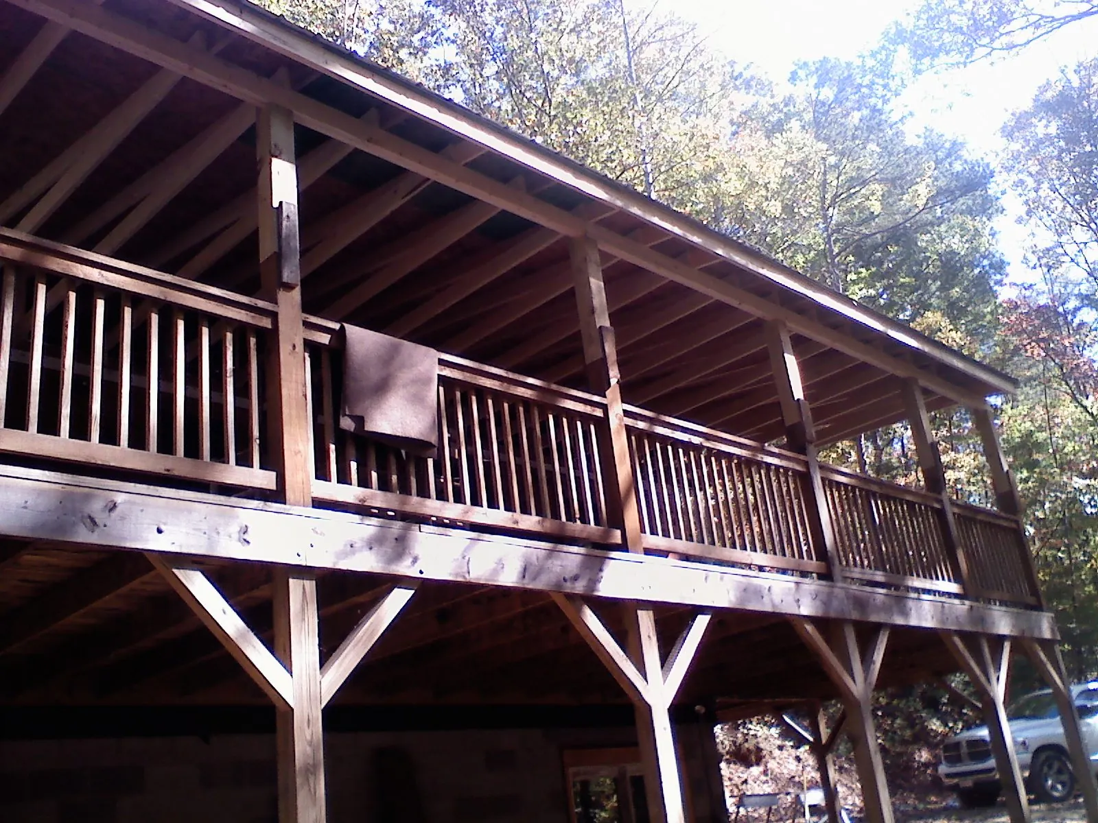 Timber framing under a new elevated porch and deck — Roof Leak Repair in New Virginia by Roofing Brothers